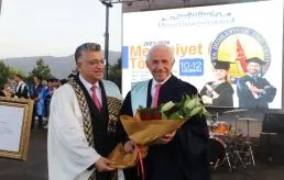 NG KURUCU BAŞKANI NAFİ GÜRAL’A FAHRİ DOKTORA ÜNVANI VERİLDİ